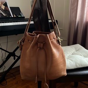 Leather Coach small tote bag with draw string. Used